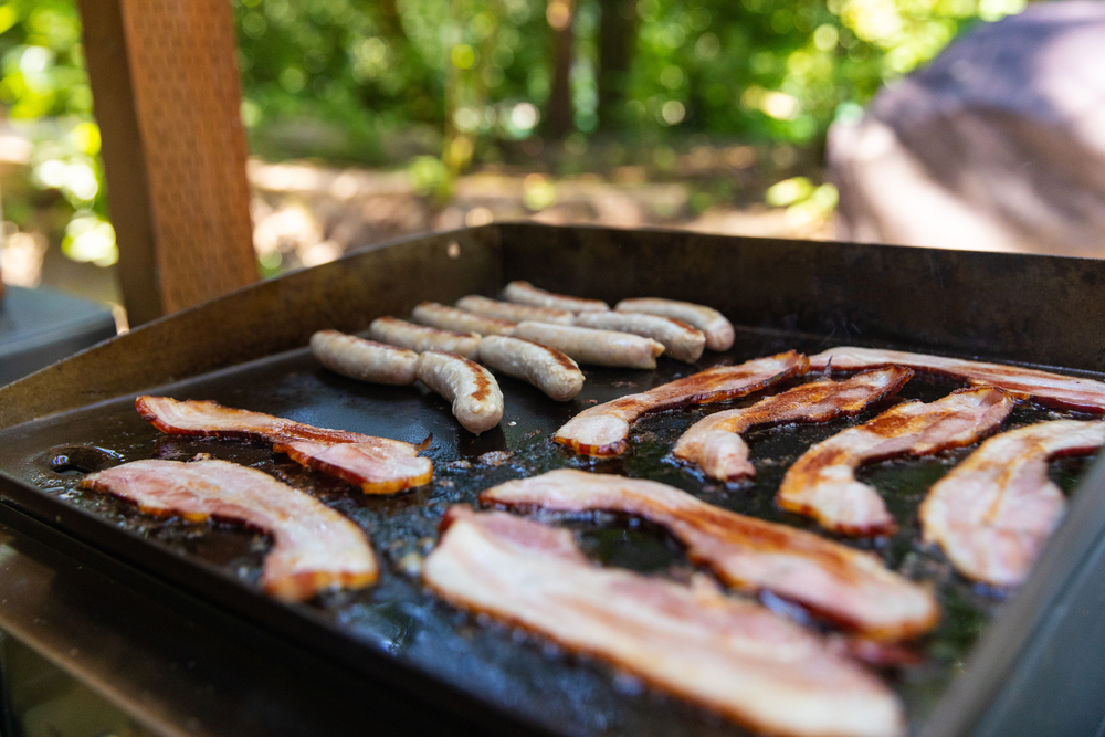 Pancakes on the griddle over the camp fire. Kids loved 'em. : r